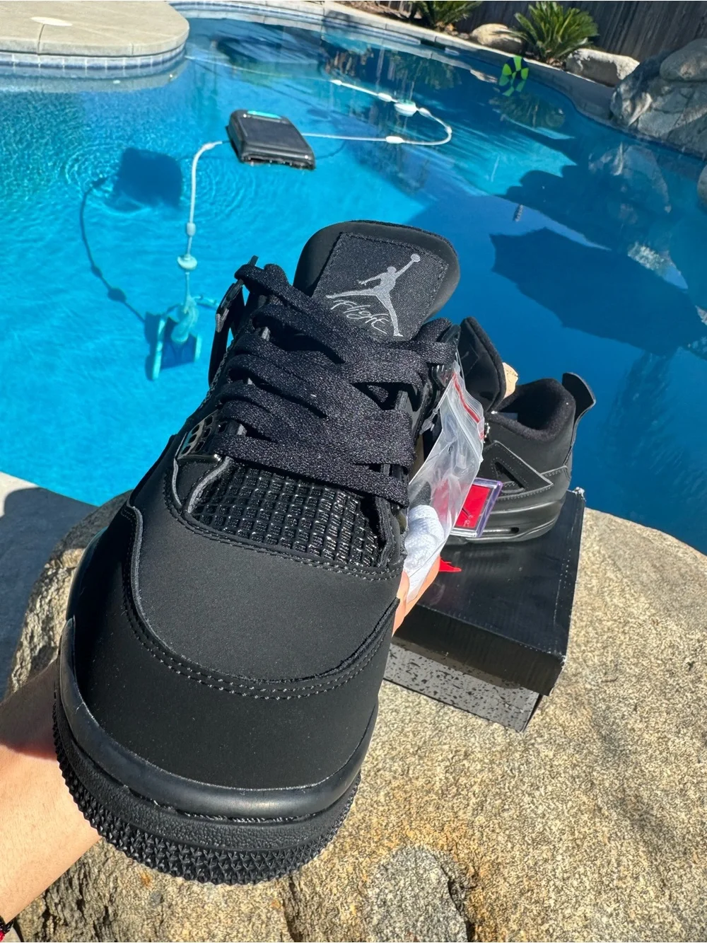 Jordan Men's Black Retro Sneakers with Subtle Red Accent